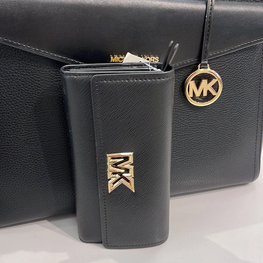 Michael Kors Mimi Large Saffiano Leather Bi-Fold Continental Wallet
Black 
NWT - Picture 9 of 16